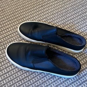 Vince. Men’s black leather fur lined rubber soled loafers.